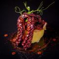 Pulpo braseado con patata y aceite de oliva